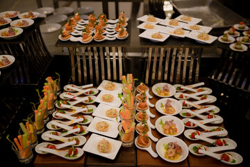 Food Buffet in Luxury Restaurant. Buffet Catering Food Arrangement on Table. The catering wedding buffet for events. dinner cocktail.