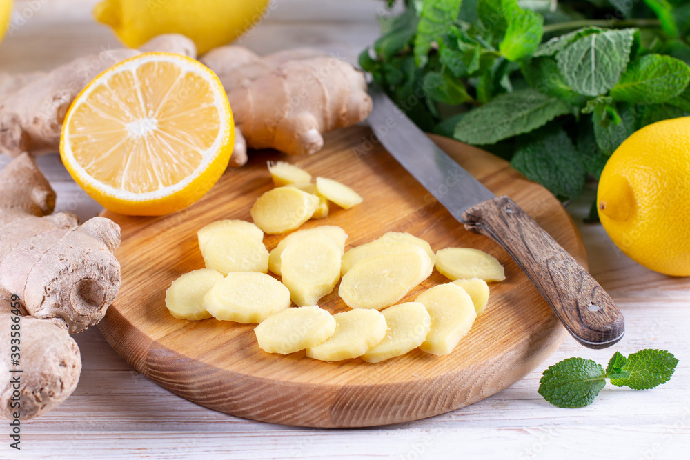 Canvas Prints Cut and peeled ginger root. Ginger root is used to increase immunity, to lose weight, whether it protects against colds and viruses.