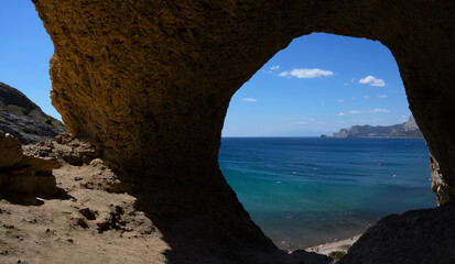 exit from the cave with sea view, Aeolian harp, arch in the rock with sea view panorama