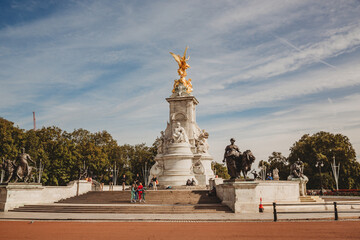 Sculpture in front of the Buckingham Palace, a sunny day in London, United Kingdom