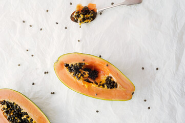 Papaya with seeds on the white  background.