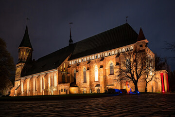 Fototapeta na wymiar Brick Gothic style Cathedral at night, side view. Formerly old German Konigsberg Cathedral, Kaliningrad, Russia