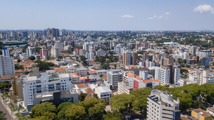 Fototapeta na wymiar Drone image taken which shows a panoramic view of the Alto da XV neighborhood in Curitiba, capital of the state of Paraná, Brazil, with its buildings and trees