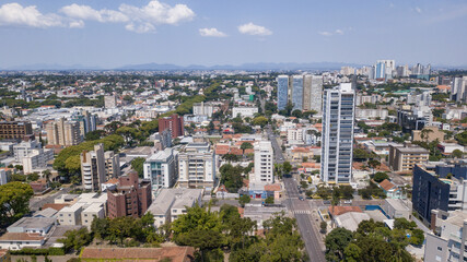 Drone image taken which shows a panoramic view of the Alto da XV neighborhood in Curitiba, capital of the state of Paraná, Brazil, with its buildings and trees