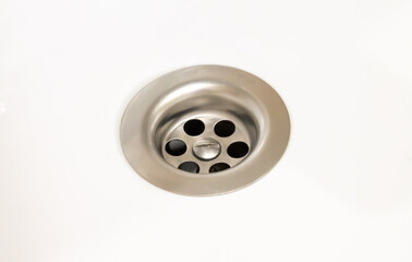 Sink drain or bathroom water drain isolated on white
