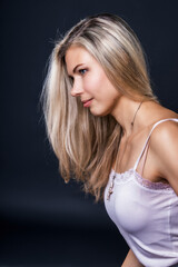 Portrait of beautiful young woman with healthy smooth skin