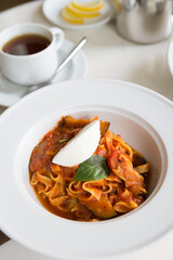 Prepared pasta served with cheese