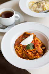 Prepared pasta served with cheese