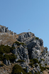 Summit cross of Kramerspitze mountain in Bavaria, Germany