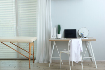 doctor's office with couch and work table. Doctor's workplace 