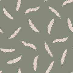 Pink feathers seamless pattern on green background.