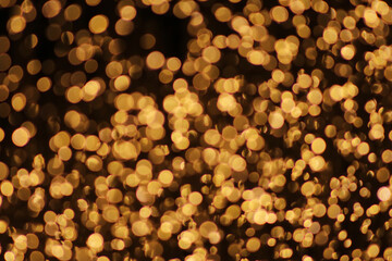 texture of outdoor Christmas lights with black background in different sizes