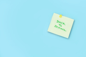 Note paper with message Back To School