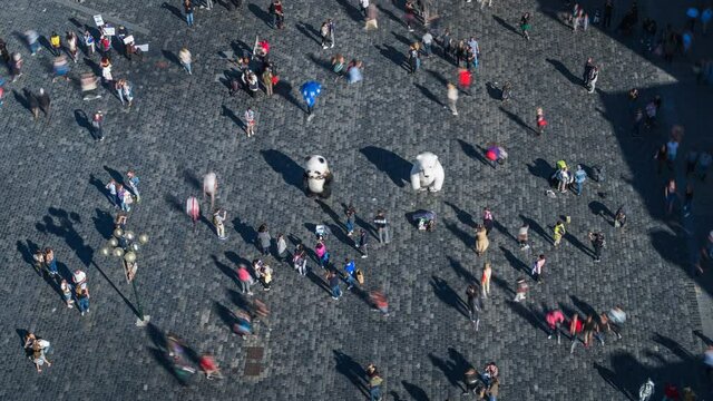 Prague, Czech Republic, daytime time lapse view of tourists at the famous Old Town Square during summer.