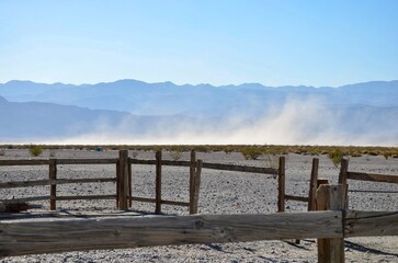 Wooden fence on a camp ground next to Mesquite Flat Sand Dunes near Stovepipe Wells in California,...