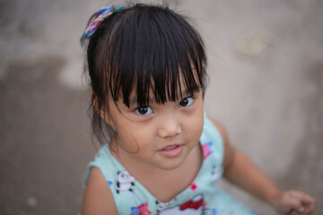 A picture of a girl's face that expresses happiness