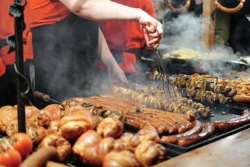 Food booth selling traditional Polish street food at a Christmas Market stall in Krakow, Poland. Traditional Polish street food in Cracow.   