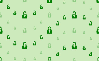 Seamless pattern of large and small green business woman symbols. The elements are arranged in a wavy. Vector illustration on light green background