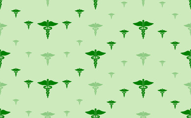 Seamless pattern of large and small green caduceus symbols. The elements are arranged in a wavy. Vector illustration on light green background
