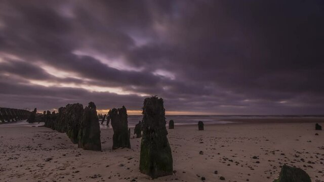 Stunning sunrise at the beach 4K timelapse  with motion control camera movement Walberswick beach Suffolk