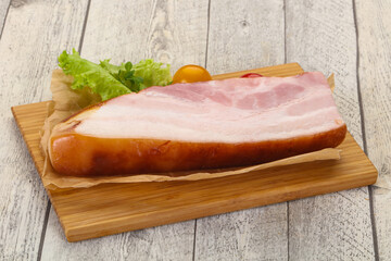 Smoked pork breast with salad leaves