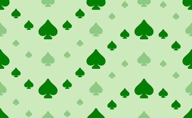 Seamless pattern of large and small green spades. The elements are arranged in a wavy. Vector illustration on light green background