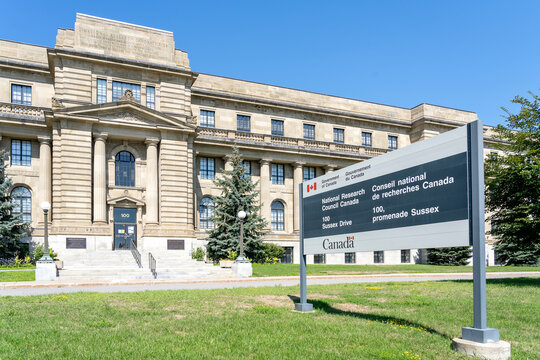 Ottawa, Ontario, Canada - August 8, 2020: Sign and building of National Research Council in Ottawa, the primary national research and technology organization (RTO) of the Government of Canada. 