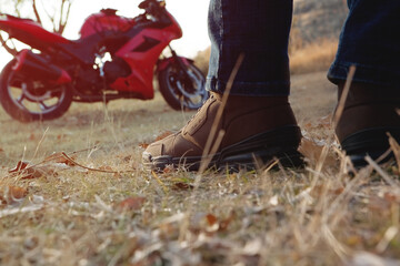 malada man eden on a red motorcycle