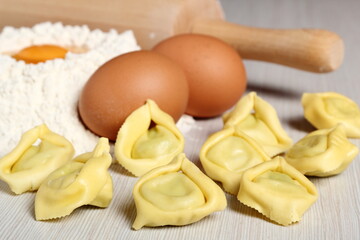 Making tortellini stuffed with spinach and ricotta