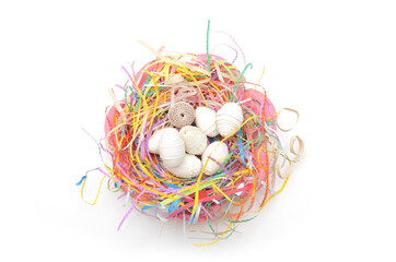 Origami eater eggs and nest on white