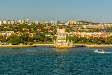 Fototapeta premium A view of river traffic on the river Tagus in front of the Belem district in Lisbon, Portugal