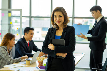 group of businessman and businesswoman wearing formal suit agreement meeting in the office new normal social distancing 