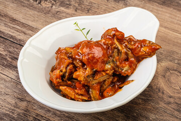 Canned anchovy in tomato sauce