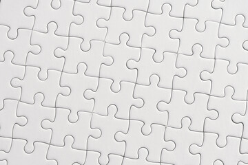 White jigsaw puzzle pattern background..