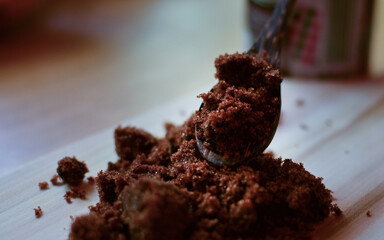 Close up of a spoon with cane sugar