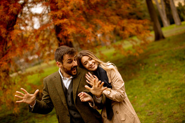 Young couple in the autumn park