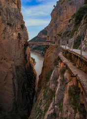 View from Caminito Del Rey mountain path along steep cliffs. Andalusia, Spain.
