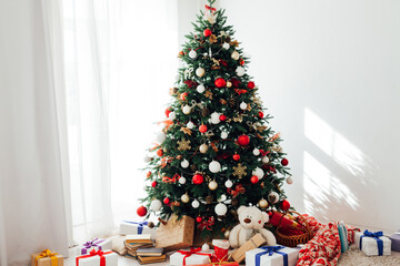 Christmas decor home Christmas tree with gifts for the new year