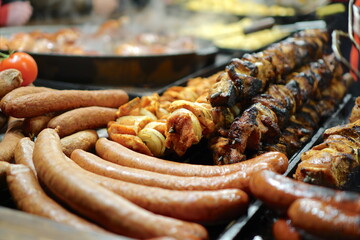 Food booth selling traditional Polish street food at a Christmas Market stall in Krakow, Poland. Traditional Polish street food in Cracow. 