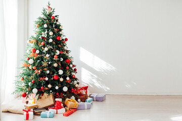 Christmas tree with gifts lights garland decor new year