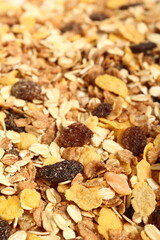 Raw muesli with dried fruits. Macro.