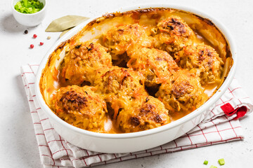 Healtthy vegetarian meatballs in a baking dish. Space for text.