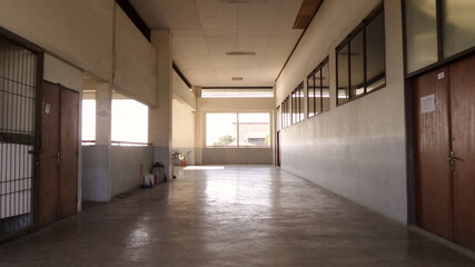 Vintage Background of Empty Campus Hallway with front daylight