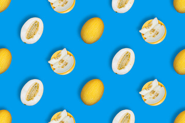 Yellow melon on a blue background. Melon seamless pattern.