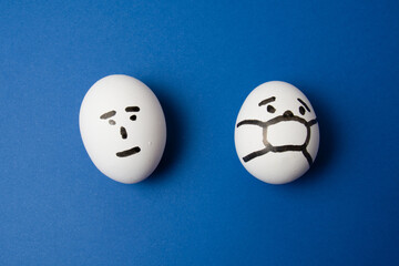Eggs with different faces: masked and not. People's attitudes towards covid 19 quarantine and self-isolation