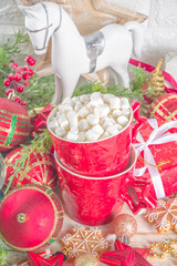 Christmas greeting cad background with decor, baubles, Xmas Gift Boxes, snow globe, hot chocolate...