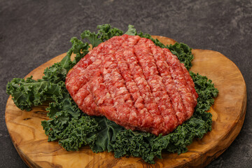 Raw beef burger cutlet for cooking