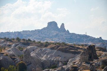 Silhouette of natural rock castle of ancient town Uchisar is highest point in Cappadocia, Nevsehir...