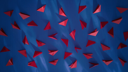 Abstract close up of 3D paper red triangles folded in geometric shapes on modern dark blue background with shadows and natural light.Horizontal banner,copy space.Attractive design in pop art style