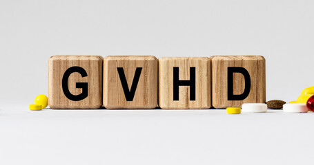 cubes with the word GVHD on them. Care concept.